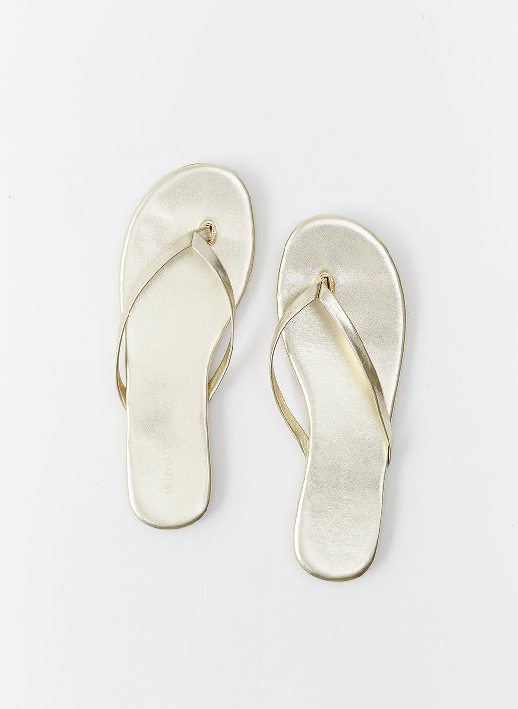 Gold metallic flip flops sandals on sale